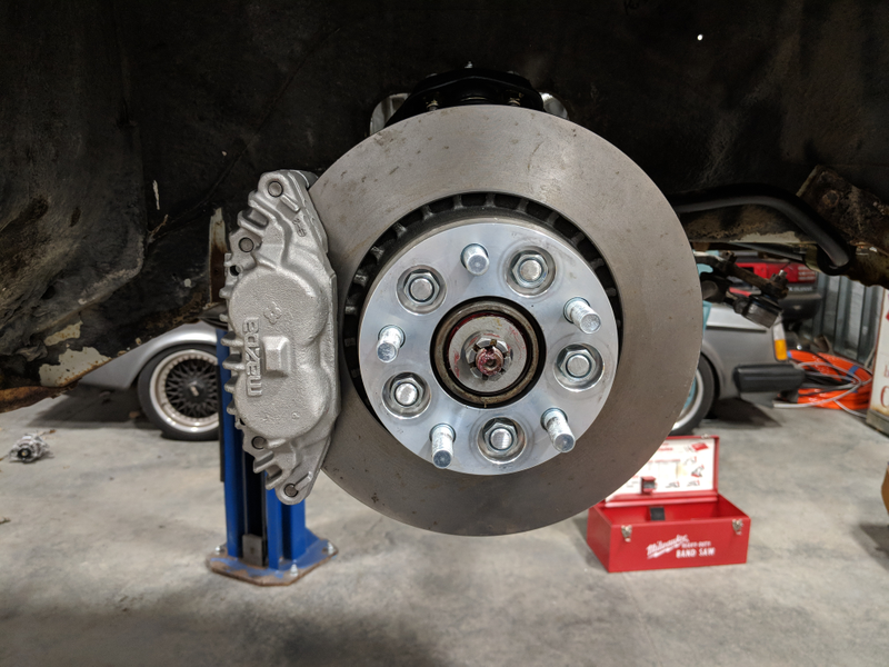 Shiny new brakes, ready to go.